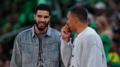 Boston Celtics forward Jayson Tatum and Charlotte Hornets forward Grant Williams