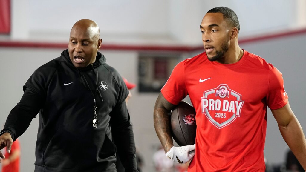 Ohio State Buckeyes running backs coach Carlos Locklyn, New England Patriots running back TreVeyon Henderson