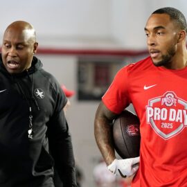 Ohio State Buckeyes running backs coach Carlos Locklyn, New England Patriots running back TreVeyon Henderson