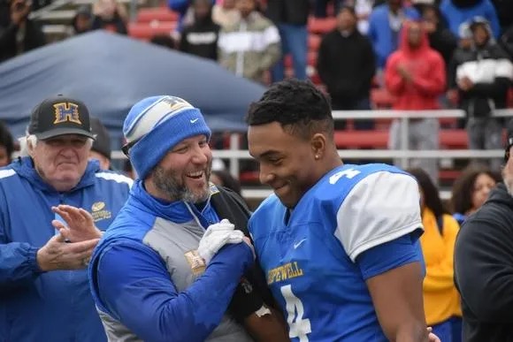 Hopewell High head football coach Ricky Irby, New England Patriots running back TreVeyon Henderson