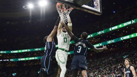 Boston Celtics forward Jayson Tatum, Orlando Magic guard Kentavious Caldwell Pope, center Wendell Carter Jr.