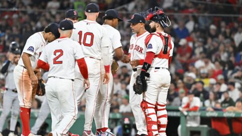 Boston Red Sox pitcher Brayan Bello and manager Alex Cora