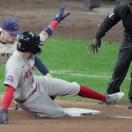 Milwaukee Brewers third baseman Caleb Durbin and Boston Red Sox infielder Marcelo Mayer