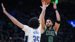 Boston Celtics forward Jayson Tatum and Orlando Magic center Goga Bitadze