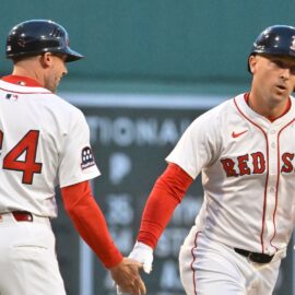 Boston Red Sox third baseman Alex Bregman, third base coach/outfield instructor Kyle Hudson