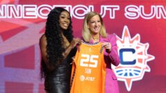 Connecticut Sun forward Aneesah Morrow, WNBA commissioner Cathy Engelbert