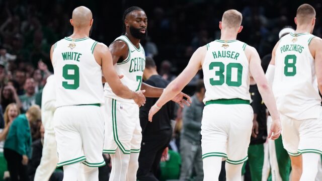Boston Celtics' Derrick White, Jaylen Brown, Sam Hauser, Kristaps Porzingis