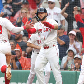 Boston Red Sox first baseman Romy Gonzalez, right fielder Wilyer Abreu, and center fielder Ceddanne Rafaela