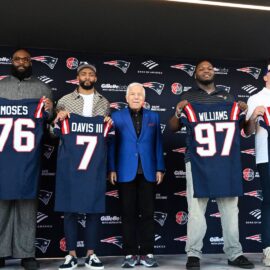 New England Patriots head coach Mike Vrabel, offensive tackle Morgan Moses, cornerback Carlton Davis III, owner Robert Kraft, defensive tackle Milton Williams, linebacker Robert Spillane and executive vice president of player personnel Eliot Wolf