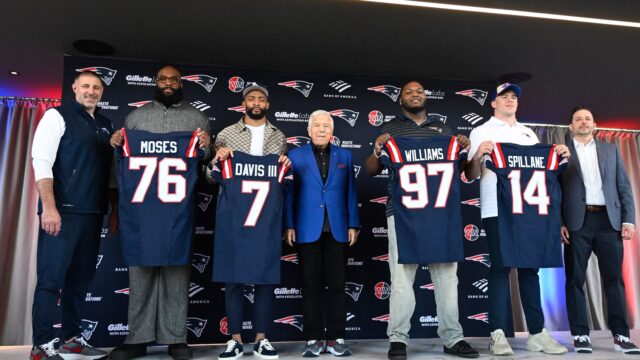 New England Patriots head coach Mike Vrabel, offensive tackle Morgan Moses, cornerback Carlton Davis III, owner Robert Kraft, defensive tackle Milton Williams, linebacker Robert Spillane and executive vice president of player personnel Eliot Wolf