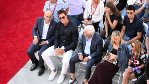 New England Patriots legend Tom Brady, and owners Robert Kraft and Jonthan Kraft