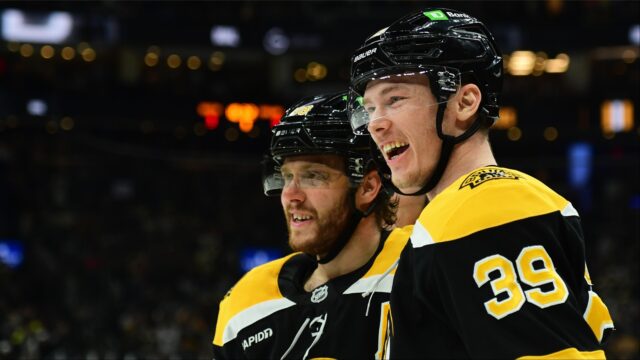 Boston Bruins forwards David Pastrnak and Morgan Geekie