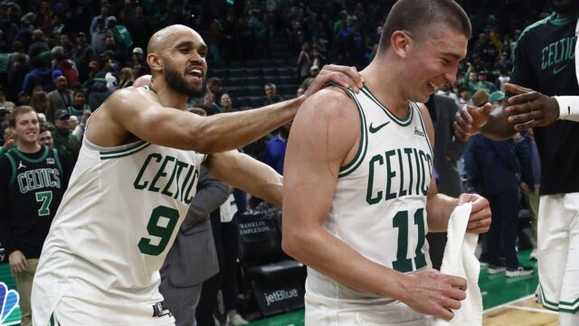 Boston Celtics guards Derrick White and Payton Pritchard