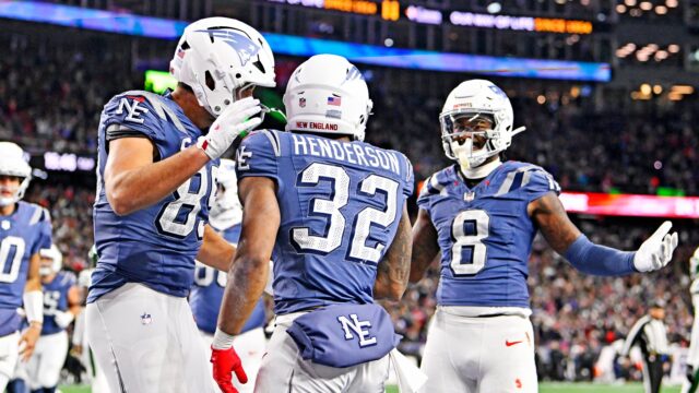New England Patriots running back TreVeyon Henderson, tight end Hunter Henry and wide receiver Stefon Diggs