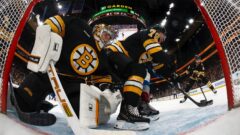 Boston Bruins goaltender Jeremy Swayman and defenseman Michael Callahan