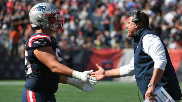 New England Patriots left tackle Will Campbell and head coach Mike Vrabel