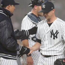 Starting pitcher Sonny Gray and New York Yankees manager Aaron Boone