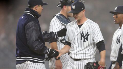 Starting pitcher Sonny Gray and New York Yankees manager Aaron Boone