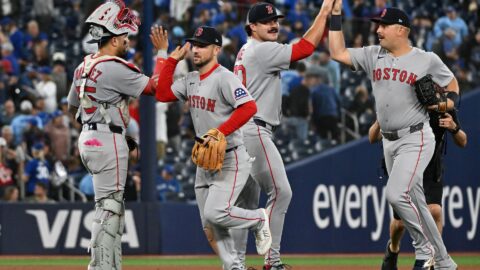Boston Red Sox third baseman Alex Bregman, catcher Carlos Narvaez, pitcher Payton Tolle and first baseman Nathaniel Lowe