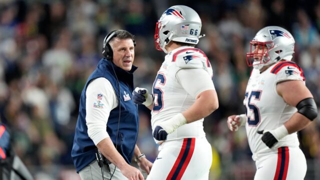 New England Patriots head coach Mike Vrabel and offensive lineman Will Campbell