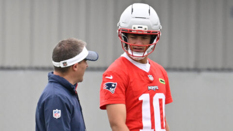 Offensive Coordinator Josh McDaniels and quarterback Drake Maye