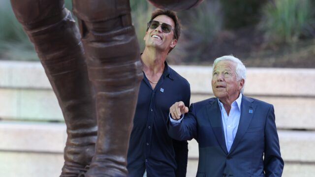 Retired New England Patriots quarterback Tom Brady and team owner Robert Kraft